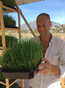 Warren at the Pretty Greens Organic Wheatgrass Farm